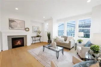 Another view of the main living area with gas fireplace.  Nook in the living room for a desk or bookshelf