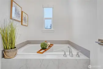 The thoughtful layout balances style and function, with elegant finishes enhancing this serene space.