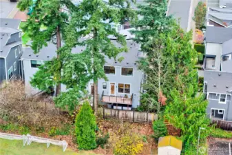 From the rear, the drone captures the home’s custom-built deck, perfectly designed for outdoor living.