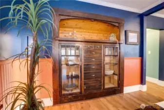 The original hutch is made for storing favorite dishes and treasures in the display cabinets, but also for tucking candles, sliverware, place mats, napkins, and other linens into the drawers.