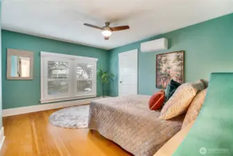 Along with custom blinds, this bedroom includes a remote controlled black out shade. If you prefer, leave the shade up for morning light at sunrise through this east window.