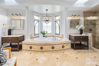 The Spa-Like Primary Bathroom Is A True Retreat. A Large Jetted Soaking Tub Invites Relaxation, While The Separate Dual-Head Step-In Shower Provides A Refreshing Spa-Like Experience. New Vanities And Plumbing & Lighting Fixtures.