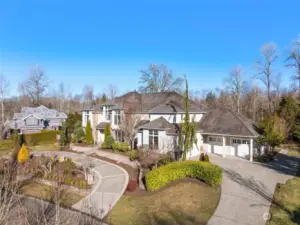 Two Driveways Lead You To The Home - One Of Those Being A Circular Drive.