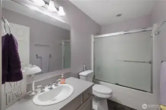 Guest  bathroom with full tub and shower