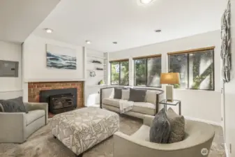 Tall ceilings and walls of windows downstairs