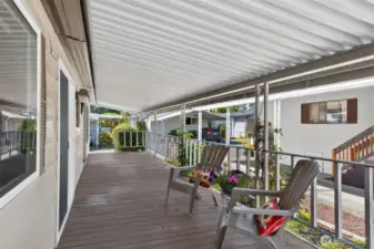 Heading outside, find space to relax on this great covered patio!