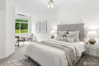 Expansive primary suite with sitting area overlooking the greenbelt and grassy knoll - deal for an office, reading nook, or your own special retreat.