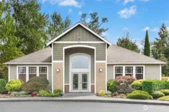 The charming clubhouse, shared by Cameray and Bordeaux residents, features welcoming spaces including a large entry area often used for yoga, cozy living and meeting rooms, a kitchenette, fitness center, restrooms with showers, and a relaxing indoor spa with easy access to the outdoor heated pool.