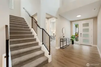 Thoughtfully placed staircase with an airy bright flow