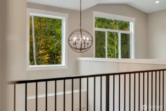 “A peaceful transition space that feels open, airy, and connected to nature.”