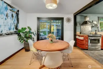 Dining area, open to kitchen, sunroom and living area.