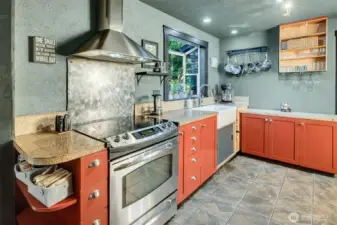 Triple reverse osmosis water filtration system built in to kitchen (AquaSana).