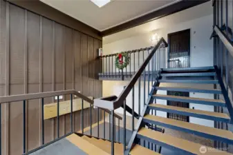 Mailboxes at the bottom of the stairs