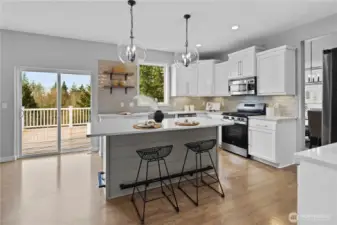Updated kitchen with quartz counters and large island