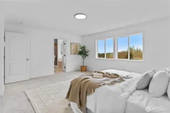 Primary features ensuite and walk in closet