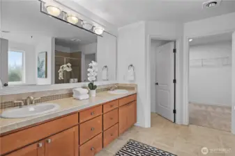 Large ensuite features dual vanity large walk in closet