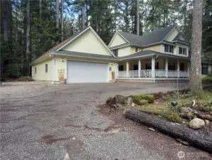RV pad and full hook up to the left of garage.