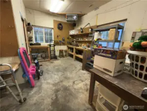 Heated shop area w/ 1/2 bath.