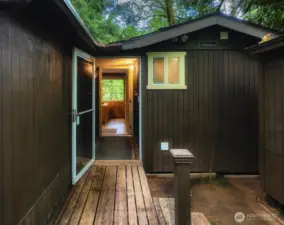 Entrance to a handy mudroom ~ great place to remove your skis or boots out of the elements.