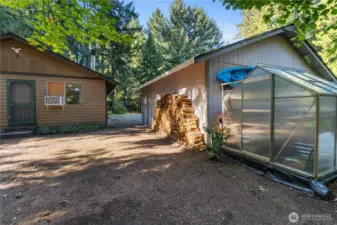 The greenhouse is included with the home.