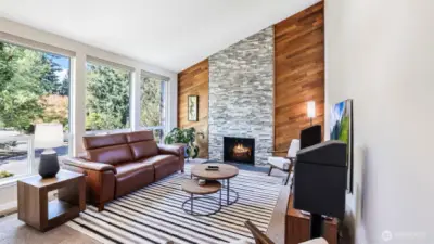 Nature and comfort combined – expansive windows bring the outdoors in, balanced by cozy finishes.