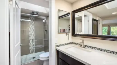 enjoy the convenience of a private water closet in this primary ensuite.