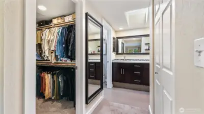 Stay organized in this spacious walk-in closet conveniently located along the hallway to the primary ensuite.