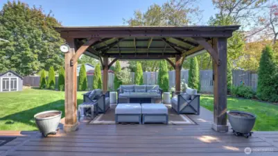 Your backyard retreat – enjoy year-round comfort with a spacious gazebo lounge