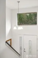 This light and bright entry, and soaring ceiling welcome you inside. Brand new interior paint throughout the home!