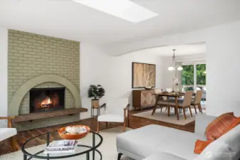 The flow from the gorgeous living room into the dining room is effortless