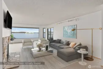 Featuring one of the largest picture windows on the beach, this expansive living room is wider than most, offering an open and inviting space designed for comfort and connection. Natural light pours in through the oversized window, showcasing stunning coastal views and creating a bright, airy atmosphere throughout the day. Whether you’re relaxing after a day by the water or hosting a gathering, this beautifully proportioned space provides the perfect setting to come together with friends, unwind, and create lasting memories.
