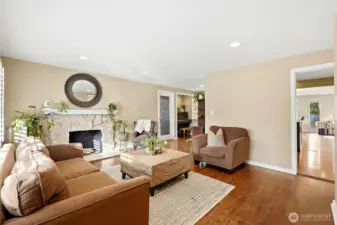The living room has a wood-burning fireplace.