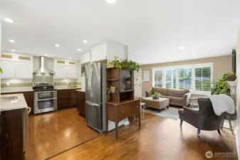 Living room and dninng nook flow directly into the updated kitchen.
