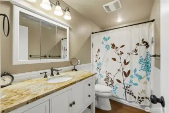 The updated bathroom has everything you need.