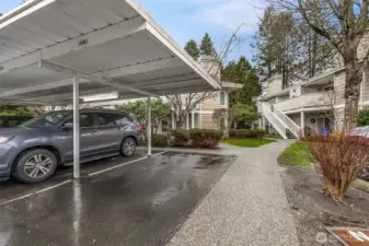 Assigned Covered Parking Space Right In Front of Unit with a Paved Walkway with No Curbs
