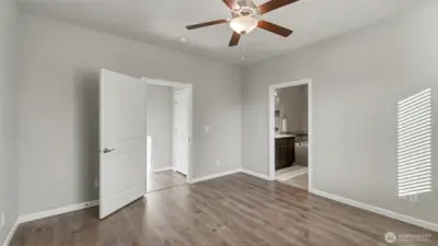Comfortable primary bedroom featuring a ceiling fan for added comfort year-round.