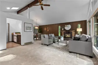 Vaulted ceilings with exposed beams add architectural interest.