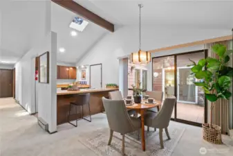 Open dining space with easy access to deck for indoor-outdoor living.