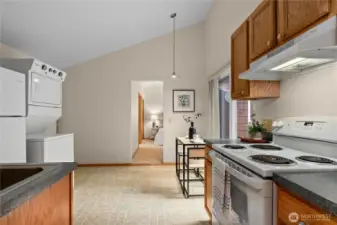 Bright kitchen with efficient layout and adjoining dining space.