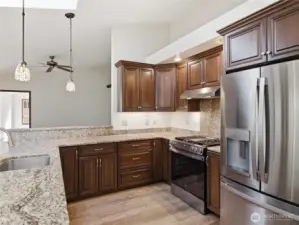 KITCHEN looking towards Family Rm and to Bonus Rm beyond.