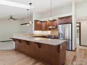 GOURMET KITCHEN - Granite Counters, new ss Appliances. Family Rm to the left and Bedroom to the right---