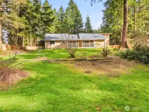BACK OF HOUSE (Shot from the Rear Yard). Shed on right.