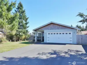 Large asphalt driveway leads to the 2-car Garage. Plenty of parking.