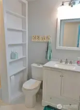 Nicely remodeled Guest Bathroom w/ mosaic tile floors and vanity.