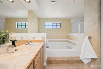 End your day with a relaxing bath in the soak tub.