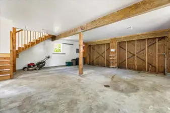 Slab interior of the barn; room for 2 cars, or a tractor, RV, boat, etc.  624 sqft.