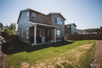 Backyard w/ covered patio