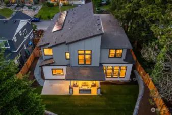 This home contains solar panels. The photo shown above is from a different MN Custom Home with a similar solar array