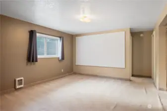 Family/TV/Bonus Room downstairs. Movie screen stays!