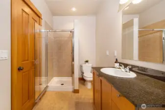 Primary bath with a soaking tub and shower.